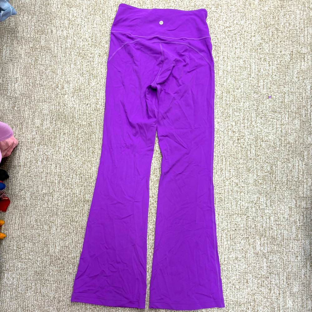 Purple lululemon boot cut leggings 8